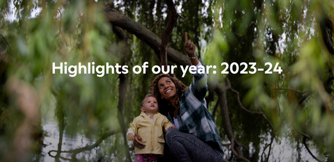 Mother and child looking up at trees with title 'Highlights of our year: 2023-24' written on top