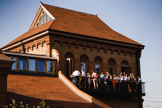 People stood on a balcony at Walthamstow Wetlands 