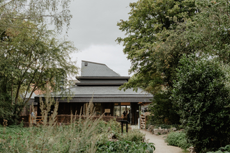 Camley street visitors centre nestled amongst trees and foliage