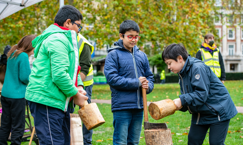 children in Grosvenor square taking part in activities