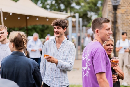 People at an event at Woodberry Wetlands