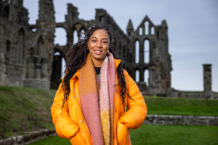 Heritage Game Changer Chantelle Lindsay in front of Whitby Abbey