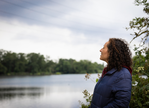 Person looking out at Walthamstow Wetlands